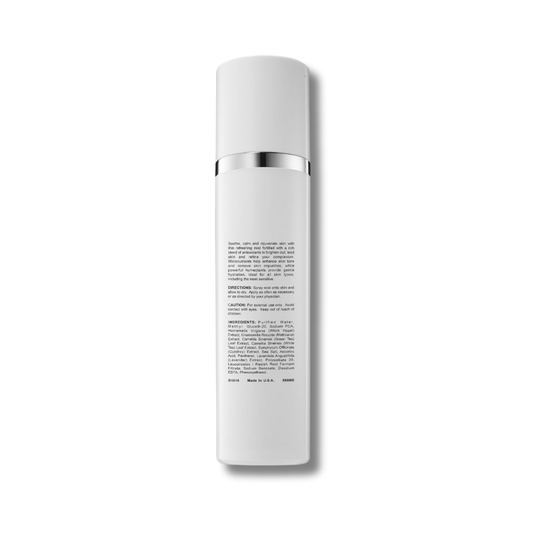 White skincare bottle with silver cap on a white background