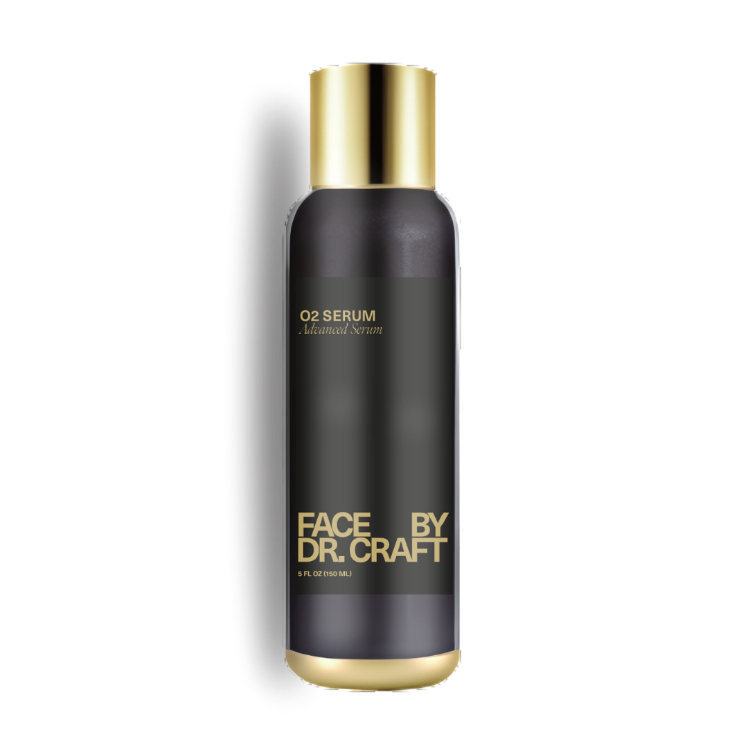 Black serum bottle with gold cap and text on a white background