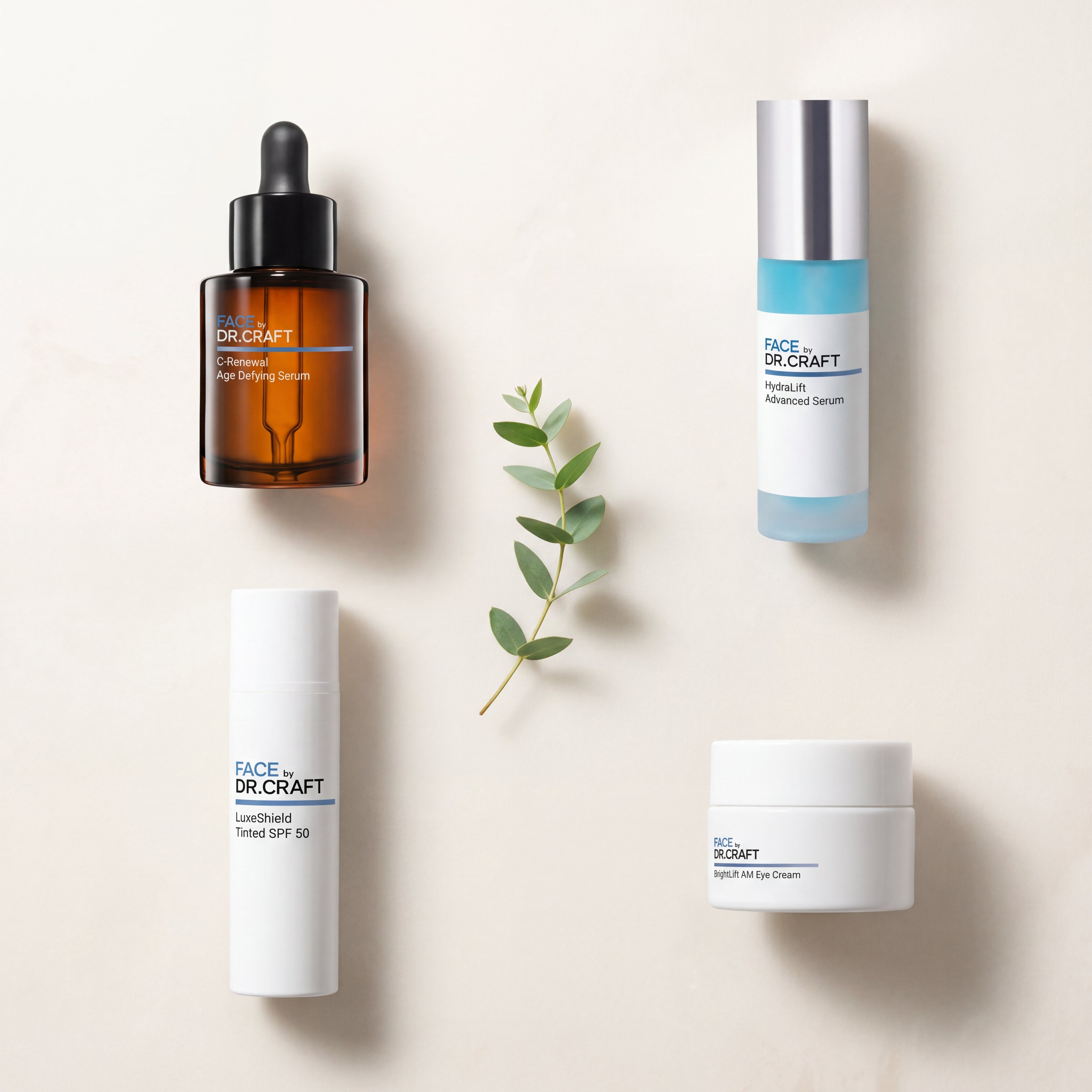 Flat lay of the four FACE by Dr. Craft products in the Age-Defying AM Protocol — C-Renewal vitamin C serum, HydraLift serum, LuxeShield Tinted SPF 50, and BrightLift AM Eye Cream — on a warm bone background.