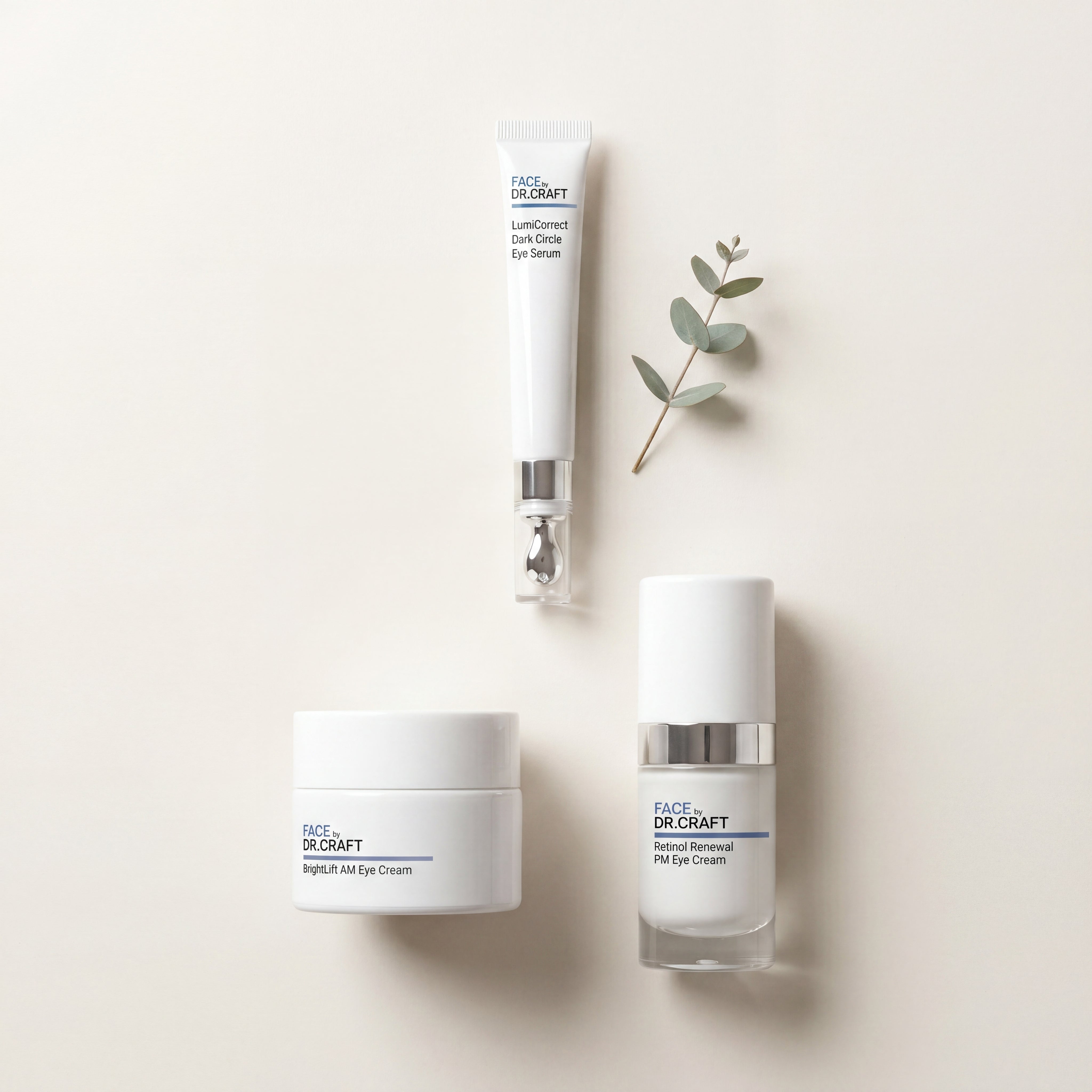 Flat lay of the three FACE by Dr. Craft products in the Complete Eye Renewal System — LumiCorrect Dark Circle Eye Serum, BrightLift AM Eye Cream, and Retinol Renewal PM Eye Cream — on a warm bone background.