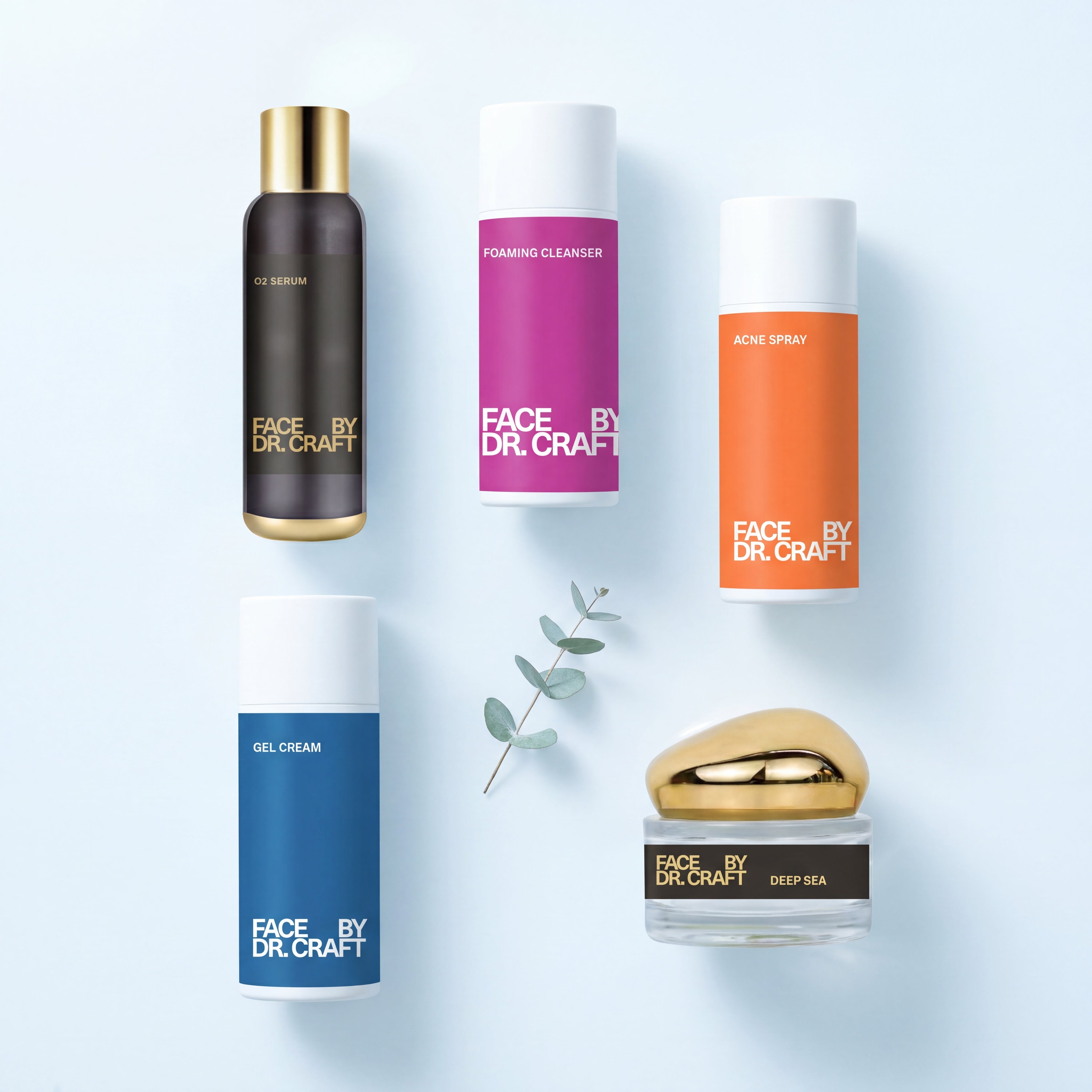 Flat lay of the five FACE by Dr. Craft K-Beauty Capsule Collection products — Radiant Renewal Face Foam, O2 Serum, HydraQuench Gel Cream, Deep Sea Radiance Moisturizer, and Clarity Control Soothing Spray — on a cool dewy blue background.