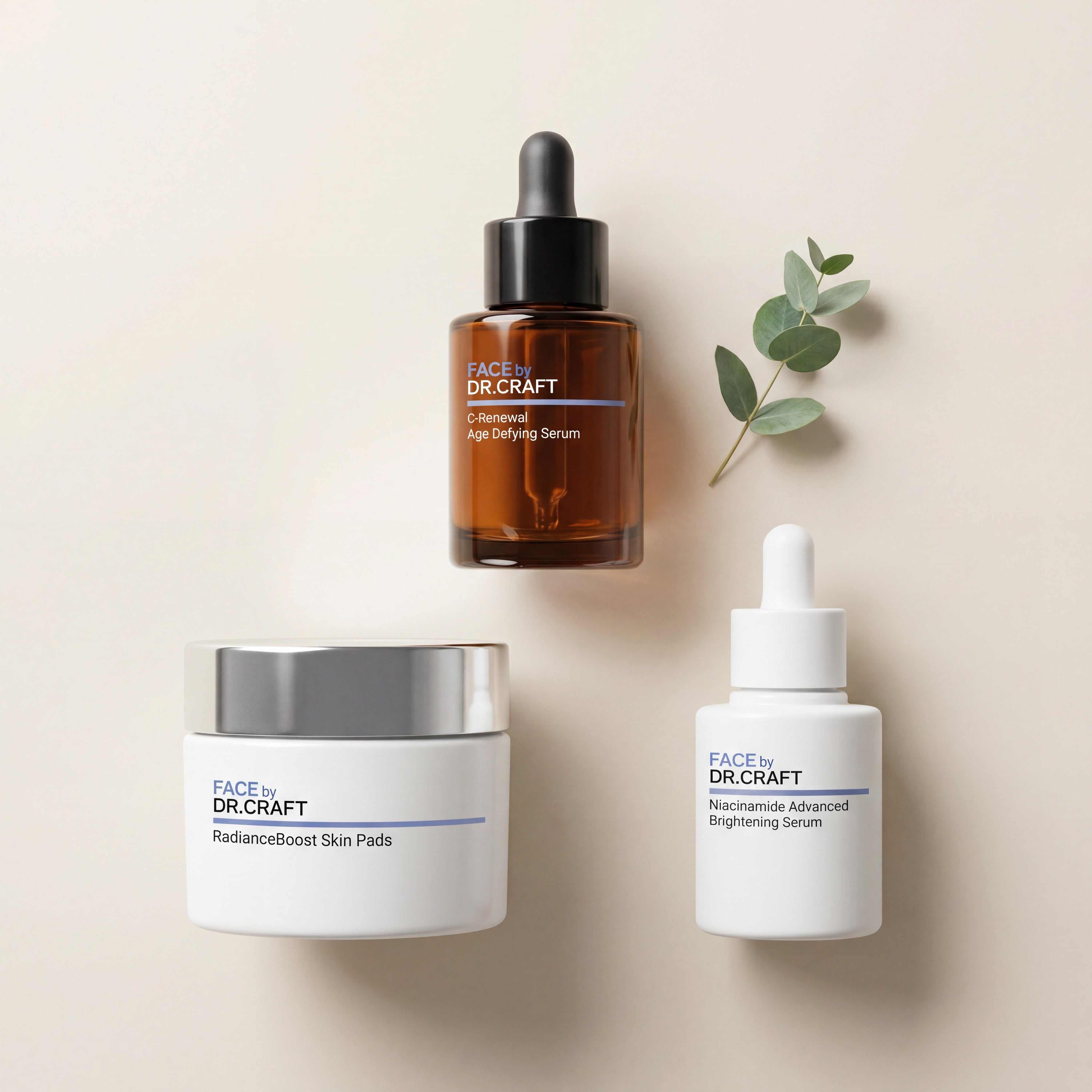 Flat lay of the three FACE by Dr. Craft products in the Radiance Reset Collection — C-Renewal vitamin C serum, Niacinamide Advanced Brightening Serum, and RadianceBoost Skin Pads — on a warm bone background.