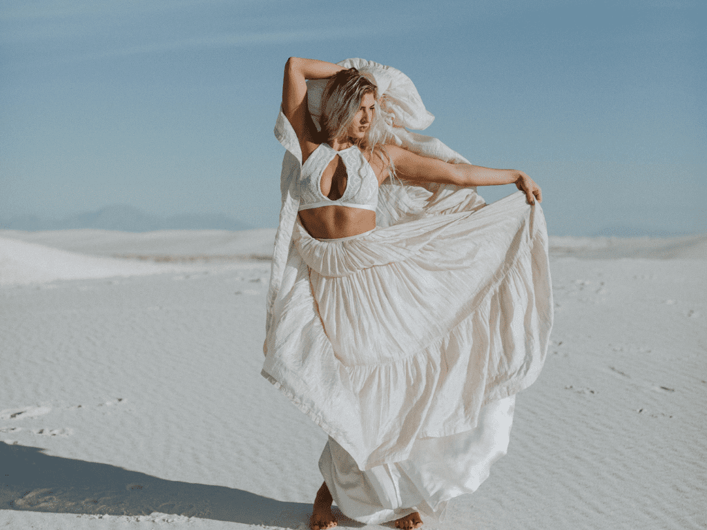 woman in a white dress at the desert